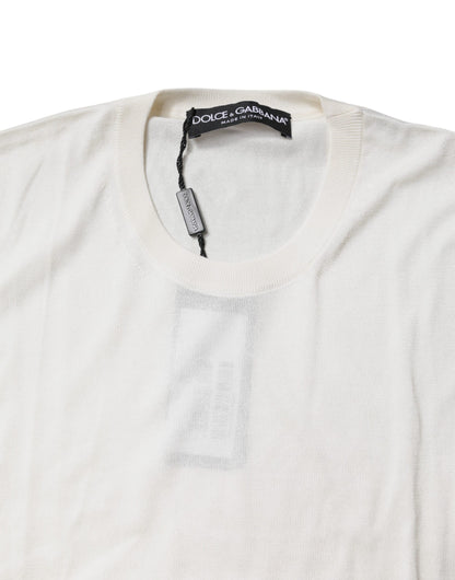 بلوزة دولتشي آند غابانا كريمية من الحرير بدون أكمام ورقبة دائرية