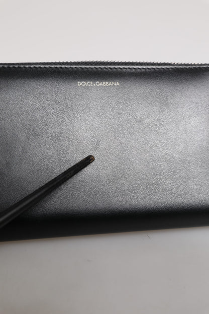 Dolce &amp; Gabbana – Kontinentale Geldbörse aus exotischem Leder mit Prägung in Schwarz und Blau