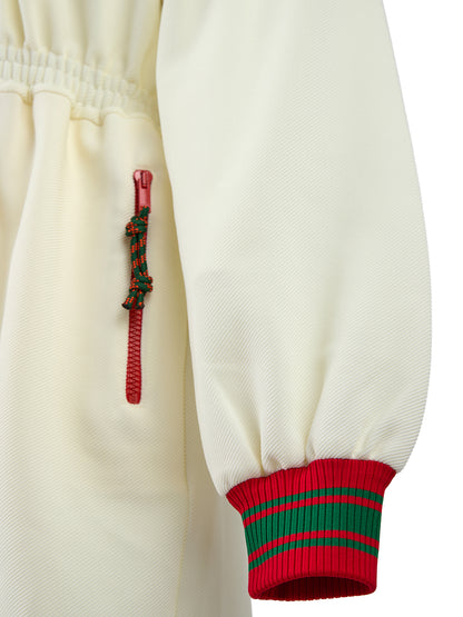 بدلة رياضية من البوليستر الكريمي بغطاء رأس وشعار Gucci