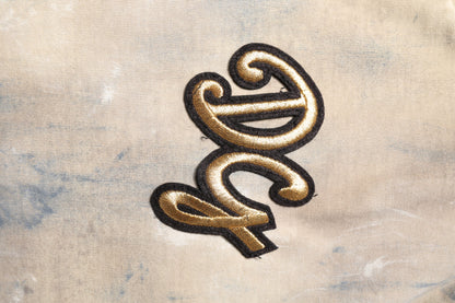 Dolce &amp; Gabbana – Kurzes T-Shirt mit Batikmuster und DG-Stickerei in Beige