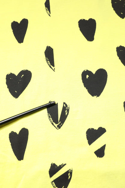 Dolce &amp; Gabbana – Ärmelloses T-Shirt aus gelber Baumwolle mit DG-Herz