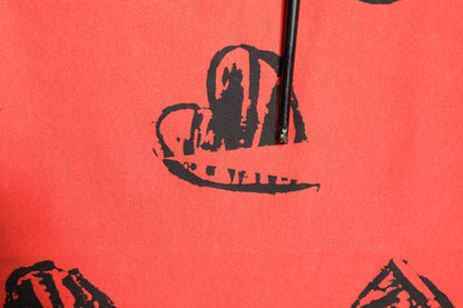 تي شيرت دولتشي آند غابانا أحمر قطني بأكمام قصيرة وشعار DG على شكل قلب