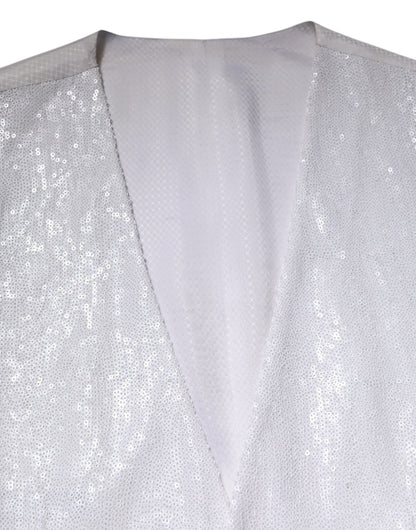 فستان دولتشي آند غابانا الأبيض المزين بالترتر مع صدرية رسمية