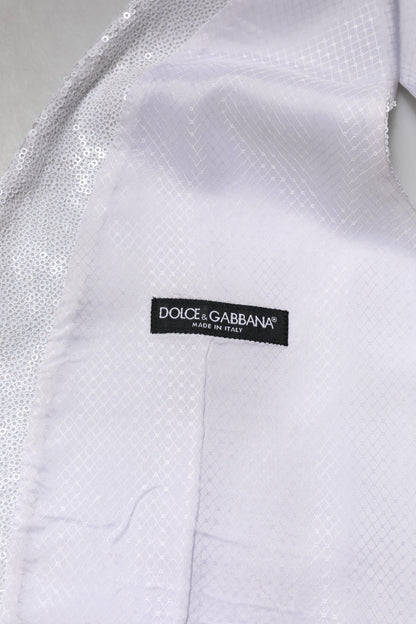 فستان دولتشي آند غابانا الأبيض المزين بالترتر مع صدرية رسمية