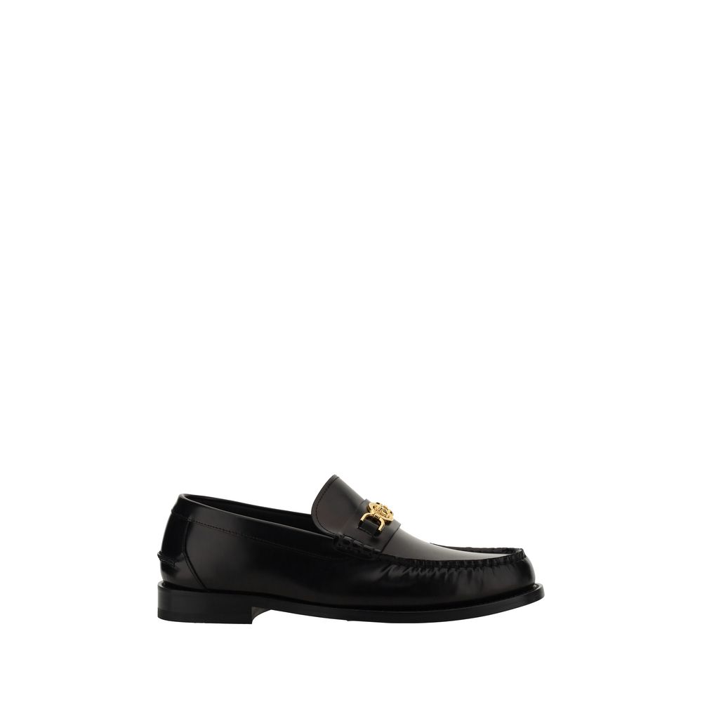 Versace Slipper aus schwarzem Kalbsleder Modell Bos Taurus zum Reinschlüpfen