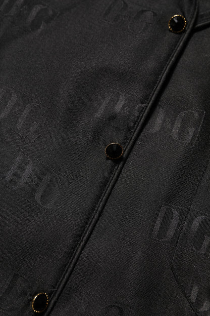 Dolce &amp; Gabbana – Schwarzes Seidenoberteil mit DG-Stickerei und langen Ärmeln