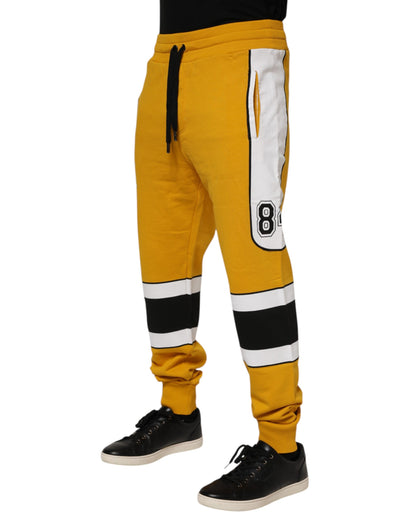 Dolce &amp; Gabbana – Jogginghose mit Logo aus gelber Baumwolle