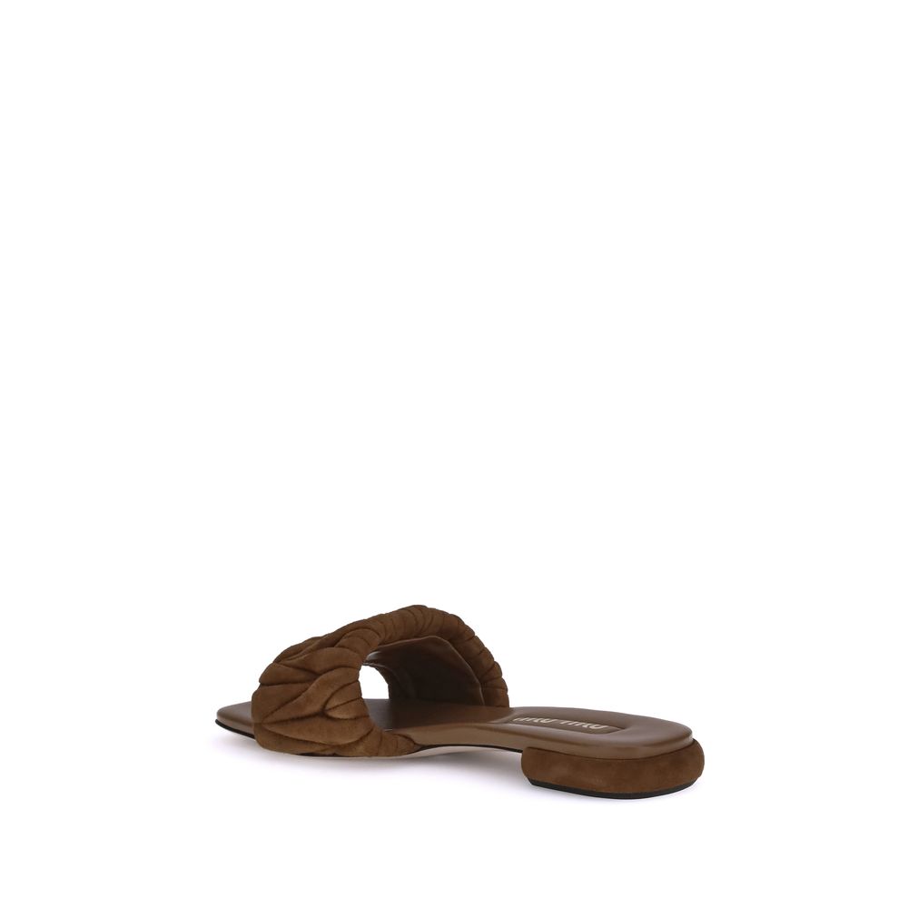 Miu Miu Schwarze Lammfell-Flatsandalen Modell Ovis Aries Aries