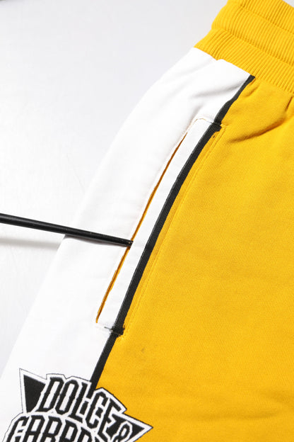 Dolce &amp; Gabbana – Jogginghose aus gelber Baumwolle mit Aufdruck