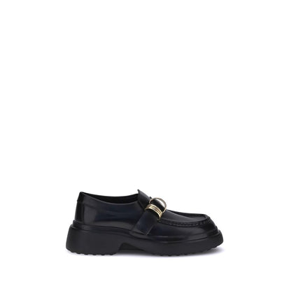 Schwarze Tod's Loafer mit Gummisohle und Plateau