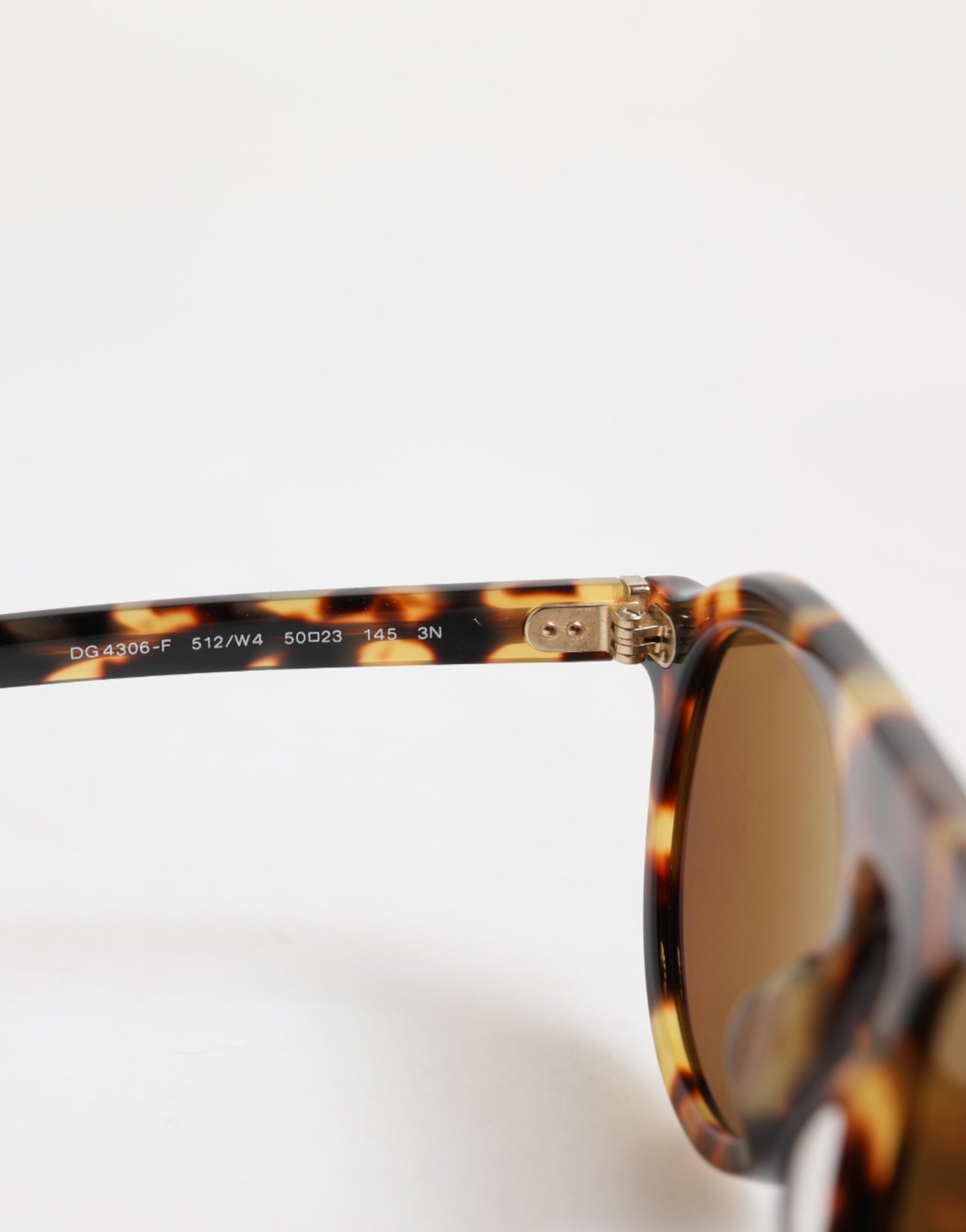 Dolce &amp; Gabbana – Runde Sonnenbrille aus Azetat mit Leopardenmuster in Braun