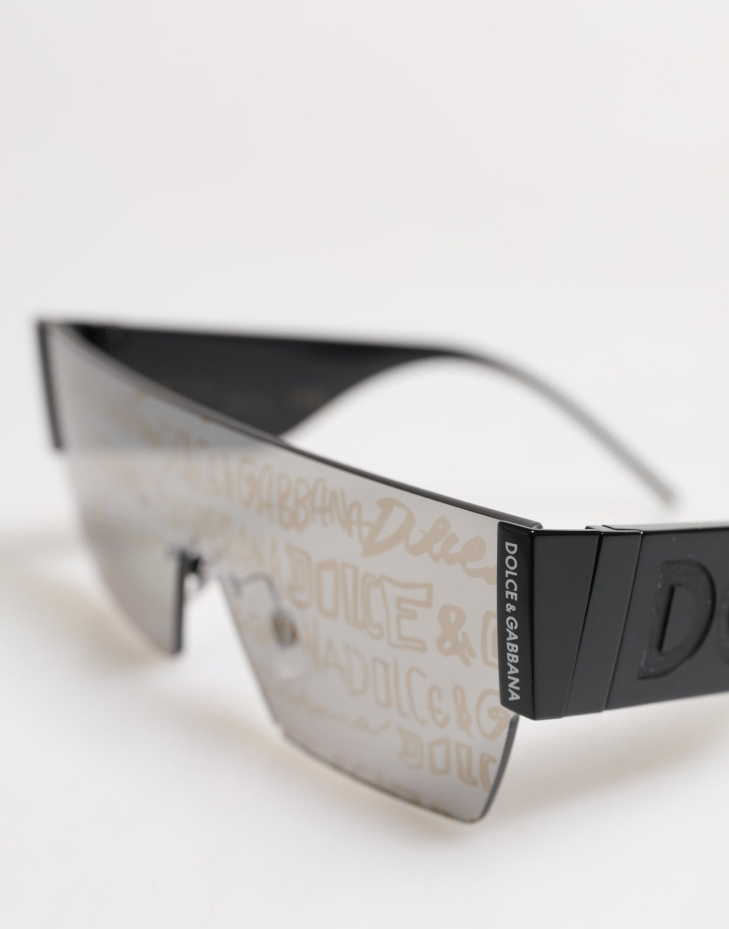 Dolce &amp; Gabbana Sonnenbrille mit schwarzem Metallrahmen und DNA-Graffiti-Motiv DG2233