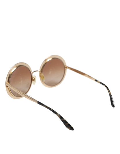 Dolce &amp; Gabbana Sonnenbrille mit rundem Rahmen in Goldbraun mit Farbverlauf DG2179