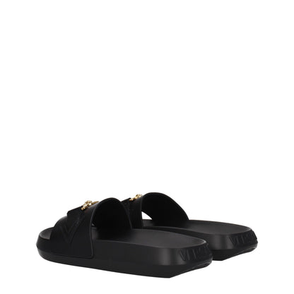 Versace Slipper aus schwarzem Leder