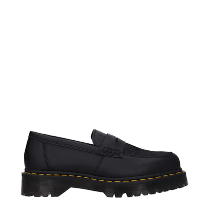 Dr. Martens – Slipper aus schwarzem Leder