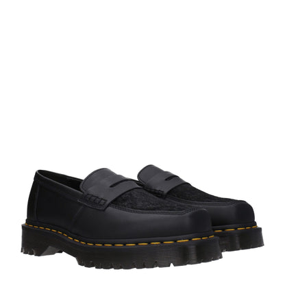 Dr. Martens – Slipper aus schwarzem Leder