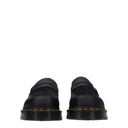 Dr. Martens – Slipper aus schwarzem Leder