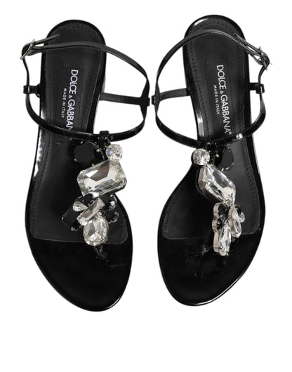Dolce &amp; Gabbana Schwarze Ledersandalen mit Knöchelriemen und Kristallen