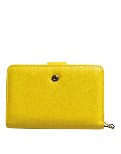 Dolce &amp; Gabbana – Zweifach gefaltete Clutch aus gelbem Leder in Kontinentalform
