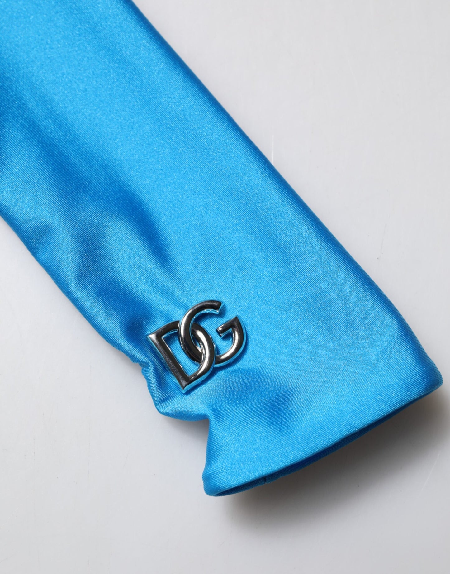 Dolce &amp; Gabbana, blaues, figurbetontes Jumpsuit-Kleid aus Nylon mit Rollkragen