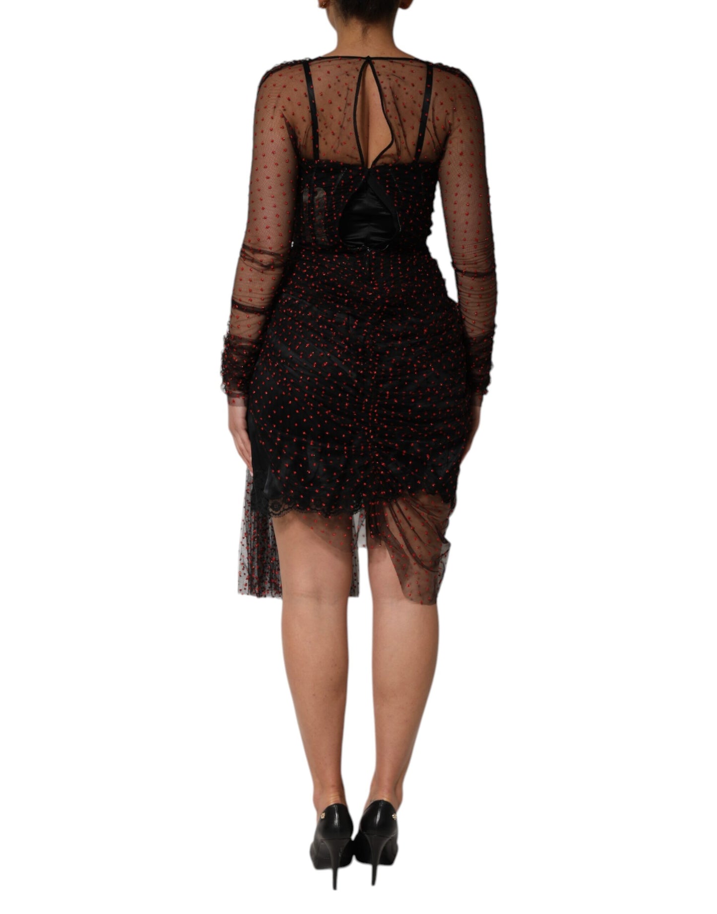 فستان دولتشي آند غابانا قصير بأكمام طويلة وحواف من الدانتيل الأسود