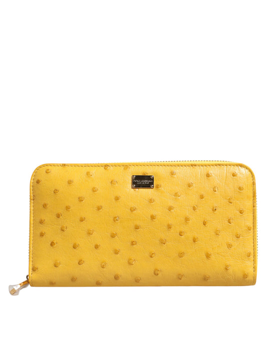 Dolce &amp; Gabbana – Kontinentale Geldbörse mit Rundum-Reißverschluss und Logo-Schild aus gelbem Leder