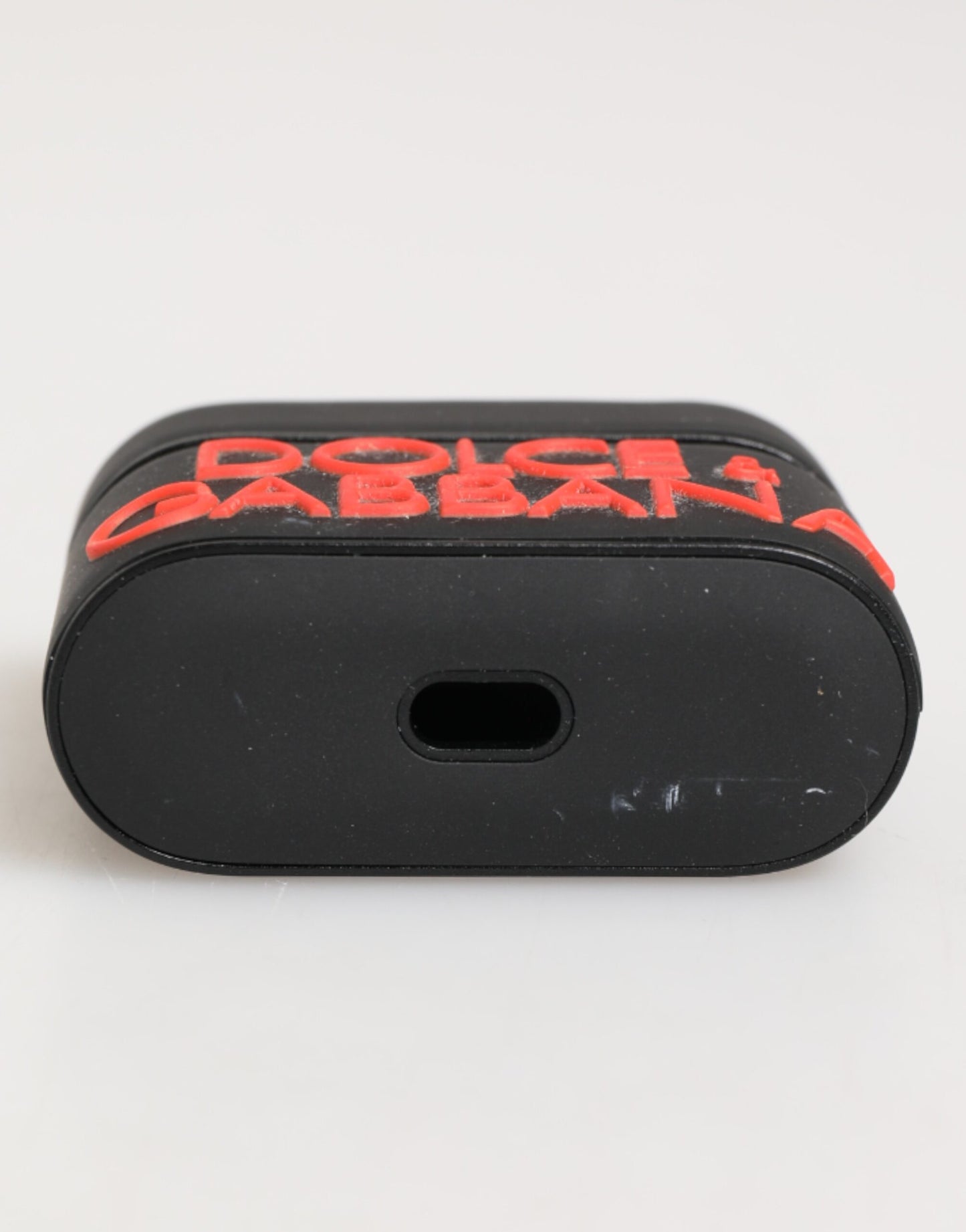 Dolce &amp; Gabbana – Airpods-Etui aus Gummi mit Logoprägung in Schwarz und Orange
