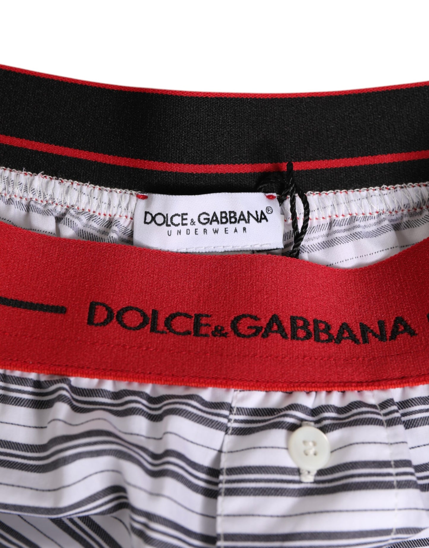 Dolce &amp; Gabbana – Badeshorts aus weiß gestreifter Baumwolle mit rotem Bund