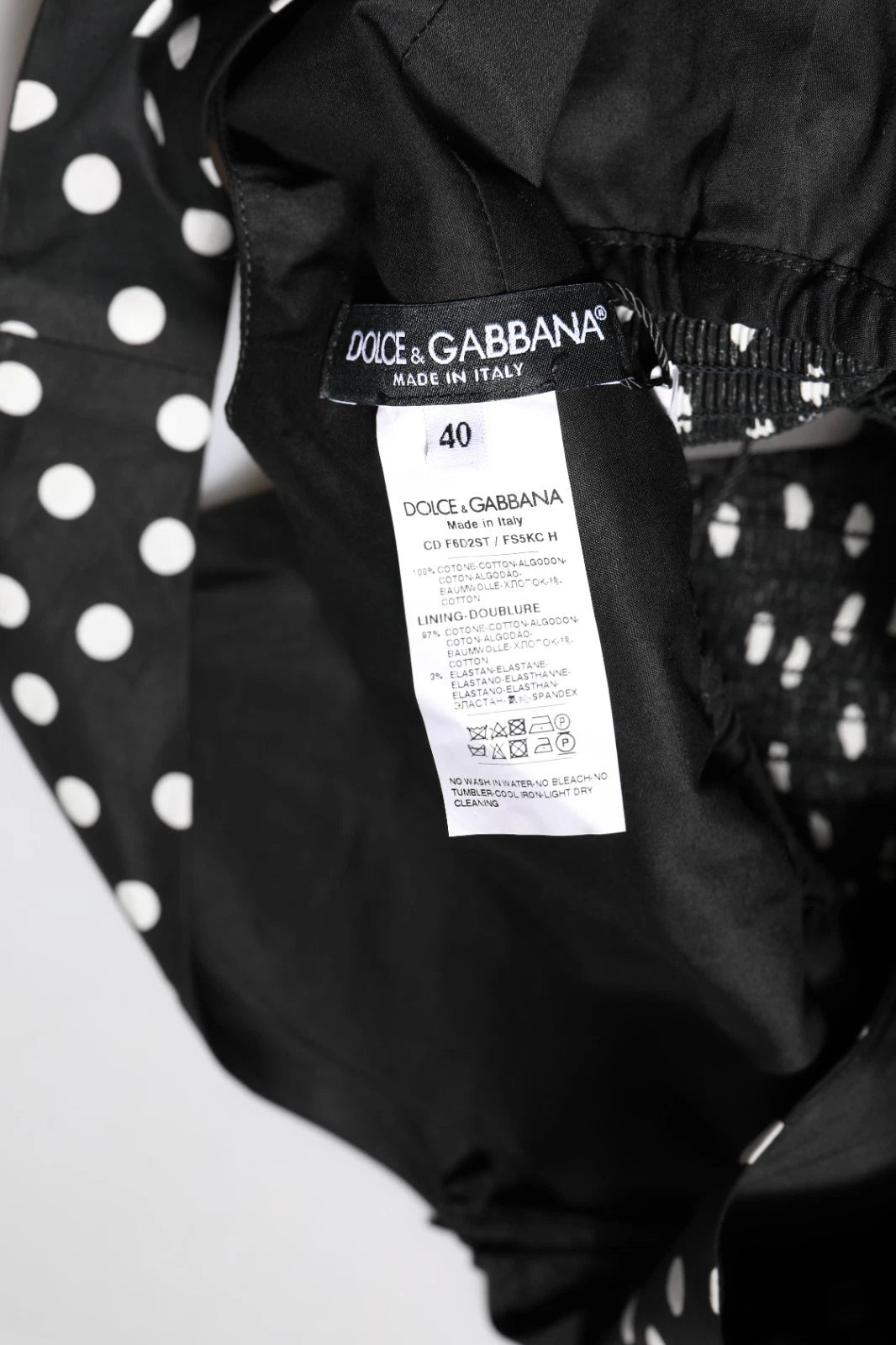 Dolce &amp; Gabbana – Schwarz-weißes Baumwollkleid mit Punktemuster und V-Ausschnitt