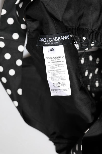 Dolce &amp; Gabbana – Schwarz-weißes Baumwollkleid mit Punktemuster und V-Ausschnitt