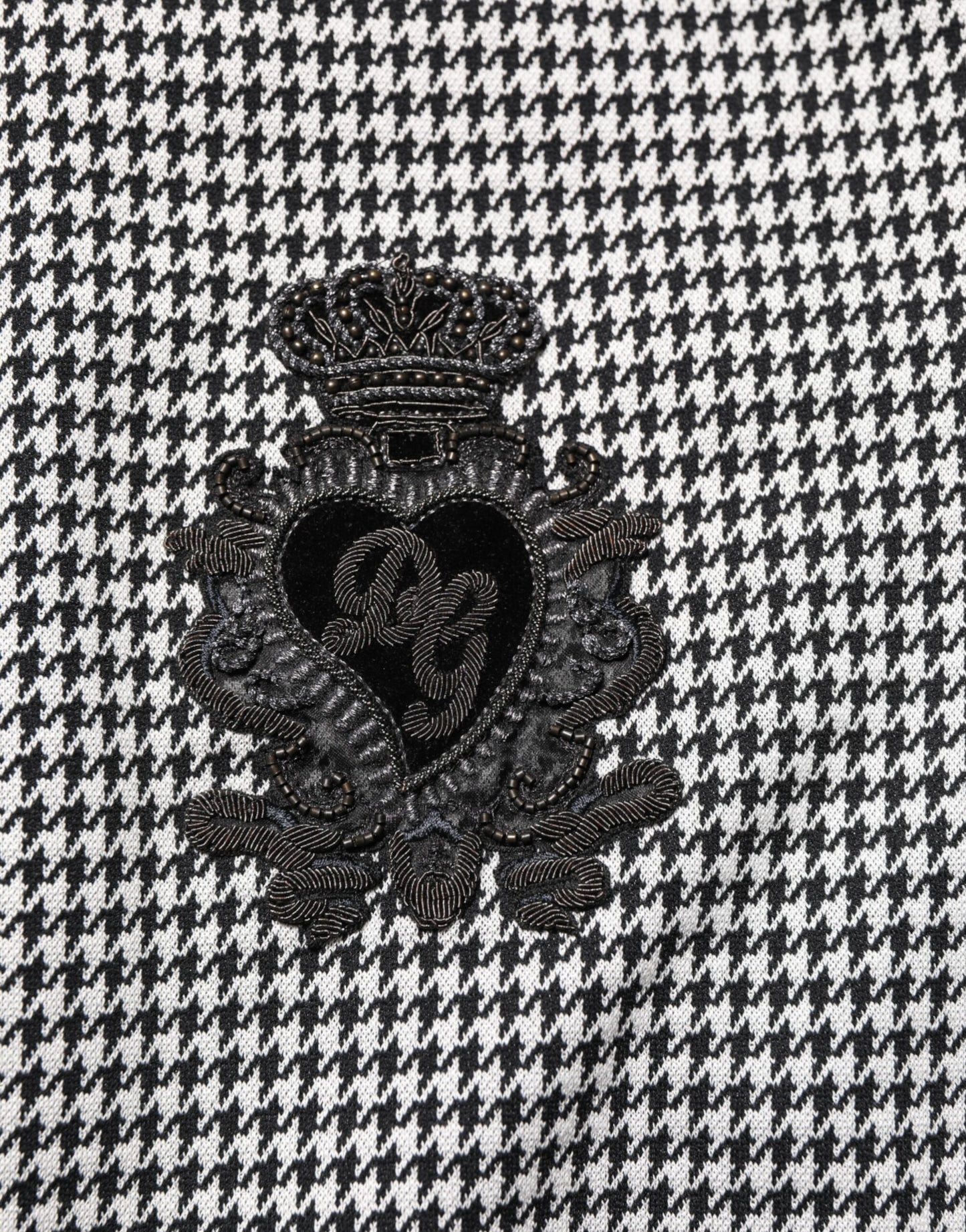 Dolce &amp; Gabbana – Schwarz-weißer Wollpullover mit Hahnentrittmuster und Wappen