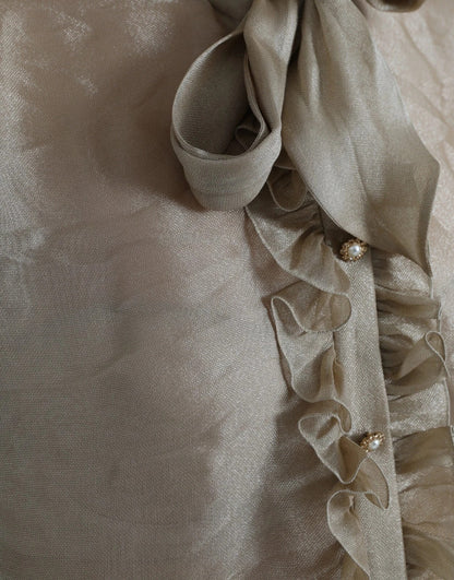 Dolce &amp; Gabbana – Blusenoberteil mit goldenem Ascot-Kragen und Rüschen