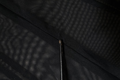 Dolce &amp; Gabbana – Langärmliger Jumpsuit-Bodysuit-Kleid aus transparentem Netzstoff in Schwarz