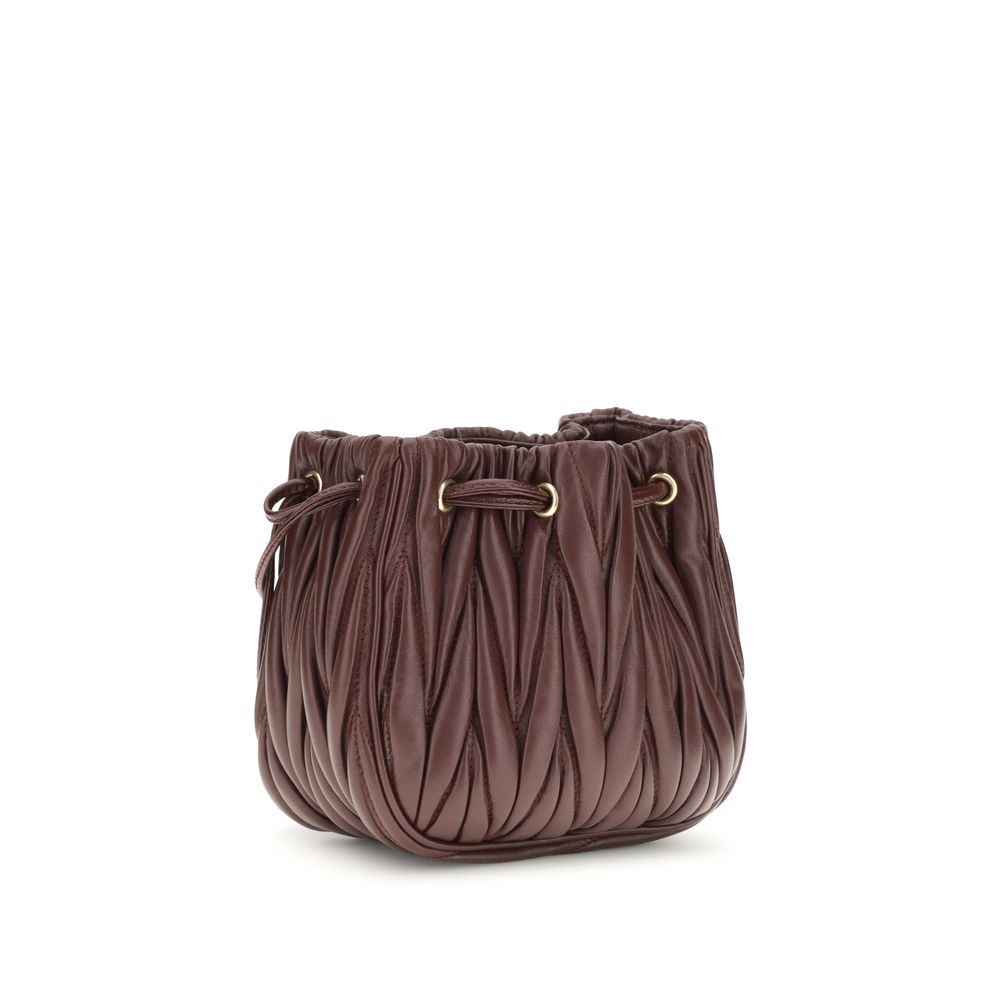 Miu Miu Clutch-Bag Bos Taurus aus bordeauxfarbenem Kalbsleder