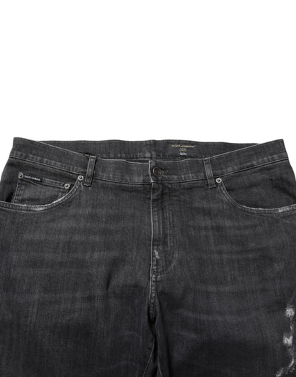 Dolce &amp; Gabbana – Slim Fit-Jeans aus schwarzer Baumwolle mit zerrissenem Logo