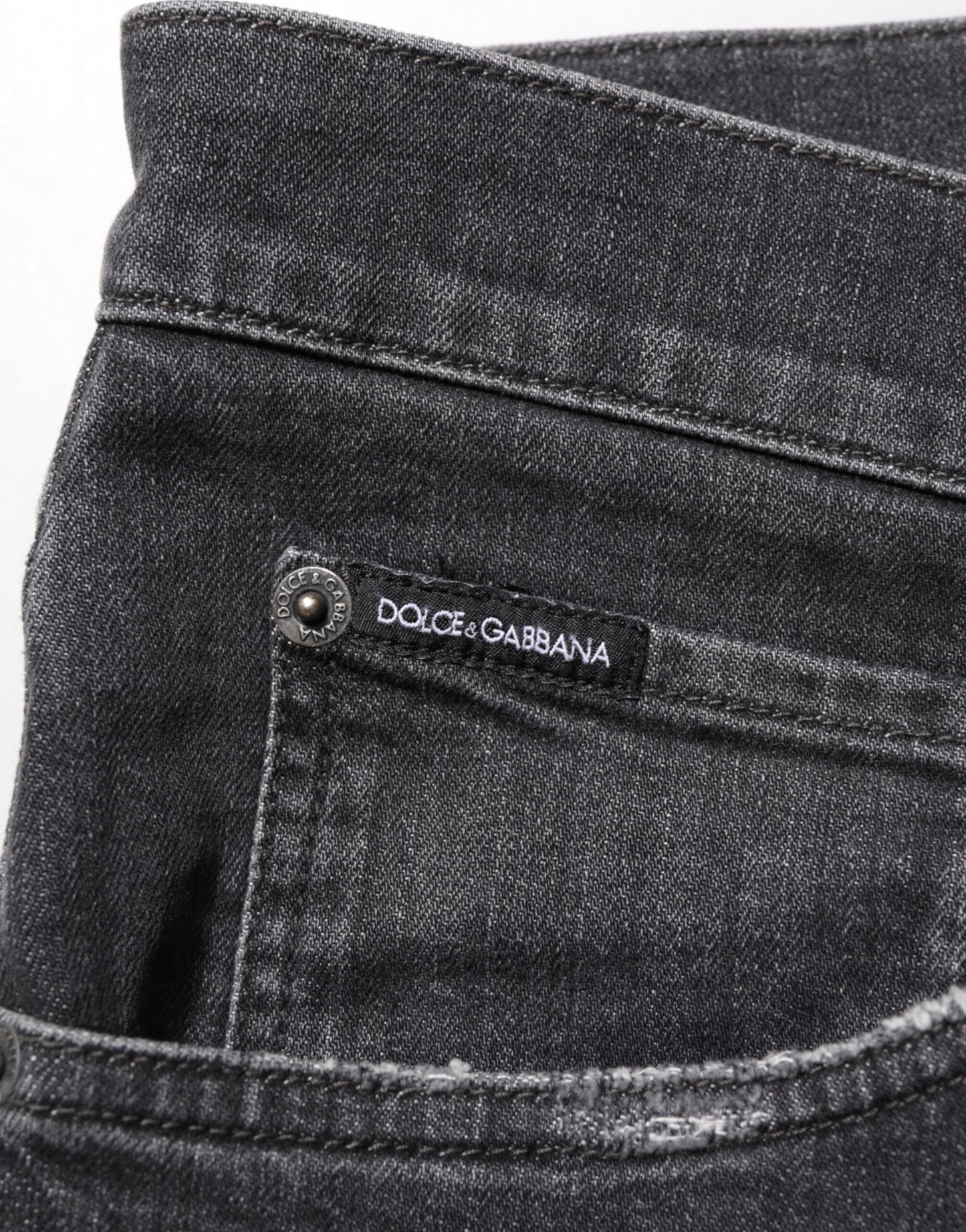 Dolce &amp; Gabbana – Slim Fit-Jeans aus schwarzer Baumwolle mit zerrissenem Logo