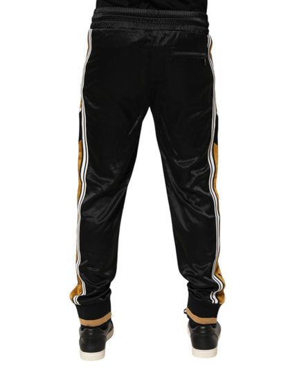 Dolce &amp; Gabbana – Jogginghose mit seitlichen Streifen und Krone aus Satin in Schwarz und Gold