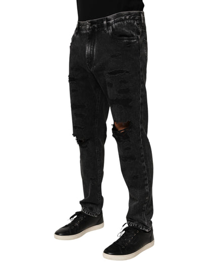 Dolce &amp; Gabbana – Lockere Jeans aus zerrissenem Baumwolldenim in Schwarz mit verwaschener Optik