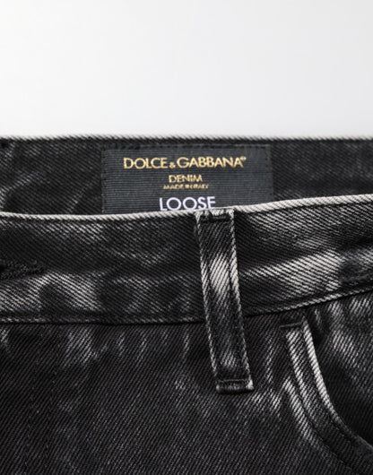 Dolce &amp; Gabbana – Lockere Jeans aus zerrissenem Baumwolldenim in Schwarz mit verwaschener Optik