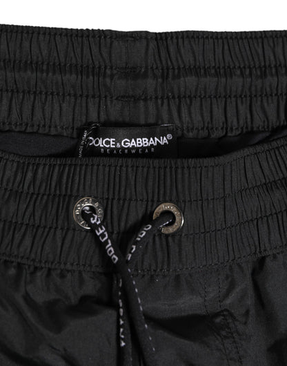 Dolce &amp; Gabbana Schwarze Strandshorts aus Polyester mit Logo