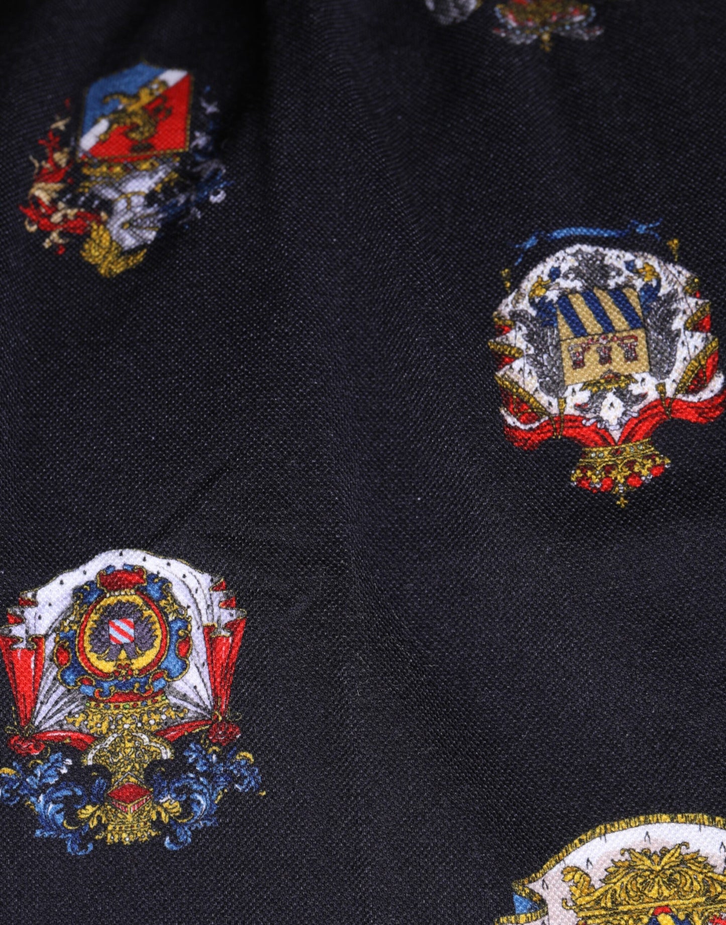 Dolce &amp; Gabbana – Blaues Poloshirt mit heraldischem Wappen-Print