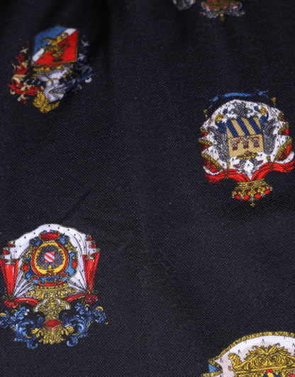 Dolce &amp; Gabbana – Blaues Poloshirt mit heraldischem Wappen-Print