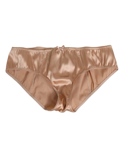 Dolce &amp; Gabbana – Slip aus Stretch-Seidensatin mit Schleife in Nude-Beige