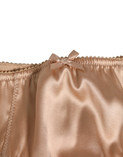 Dolce &amp; Gabbana – Slip aus Stretch-Seidensatin mit Schleife in Nude-Beige