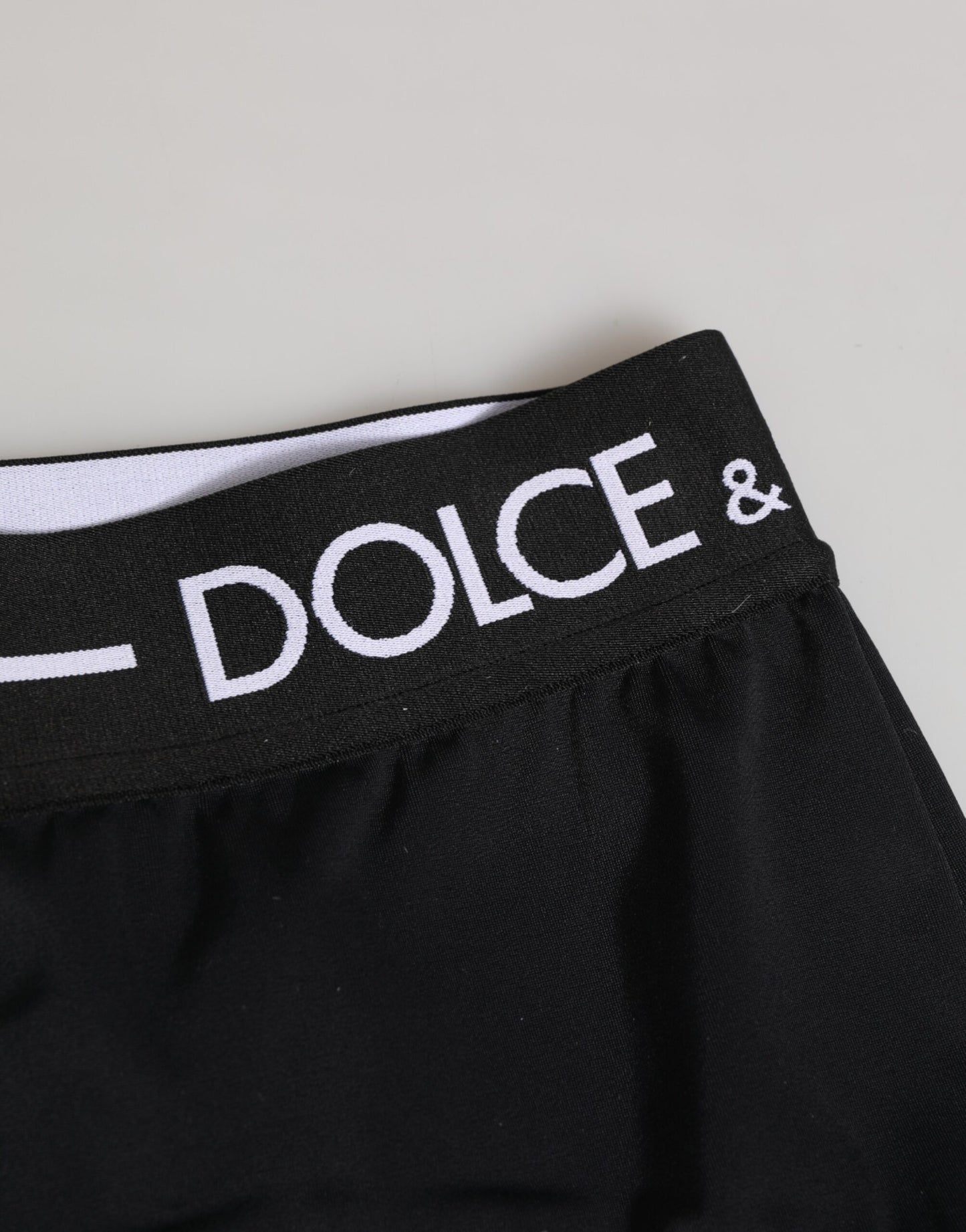 Dolce &amp; Gabbana – Schwarze Nylon-Shorts mit Logobund