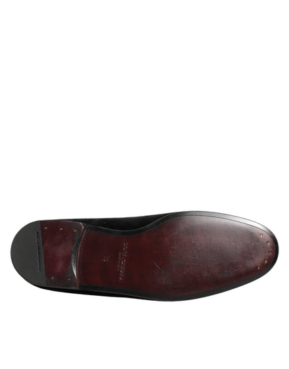 Dolce &amp; Gabbana – Schwarze Slipper mit Kreuzverzierung