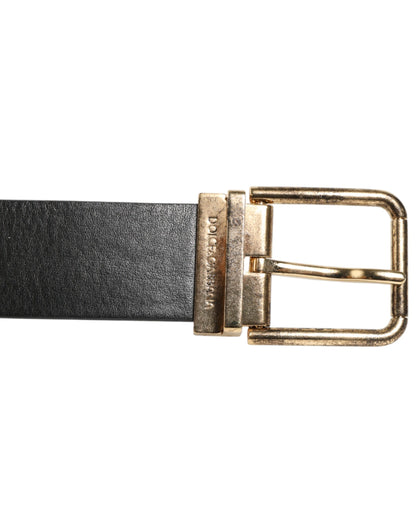 Dolce &amp; Gabbana Gürtel aus schwarzem Leder mit gold-silberner Münzschnalle