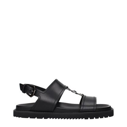 Versace – Flache Sandalen aus schwarzem Leder