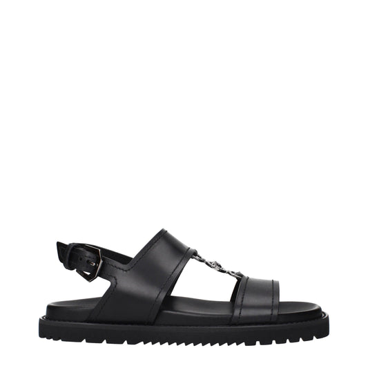 Versace – Flache Sandalen aus schwarzem Leder