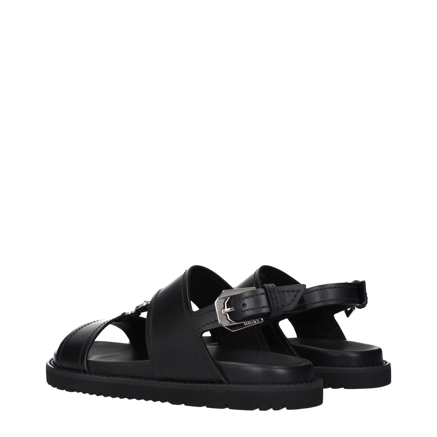 Versace – Flache Sandalen aus schwarzem Leder